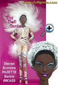 A flash of feathers, a sprinkling of sequins, and daring design elevate one stylish woman to fashion icon status. Inspired by the dazzling world of a retro showgirl, she makes a show-stopping entrance that wows any audience from the catwalk to the stage and beyond!  Stephen Burrows Pazette Barbie doll, created by the renowned designer, wears an extraordinary ensemble that stuns with silvery glitter, rhinestones, and sequins. The luscious shade of nude plays against beautiful deep skin tone and black hair pulled into an elegant chignon. A silvery headpiece features a cascade of white feathers.  